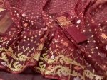 Maroon and golden Jamdani Saree