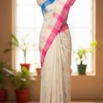 Off white monipuri saree.