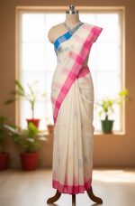 Off white monipuri saree.