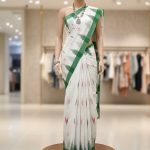 White and green monipuri saree